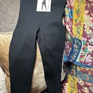 Naked Wardrobe leggjngs in size XS NWT in the color way black